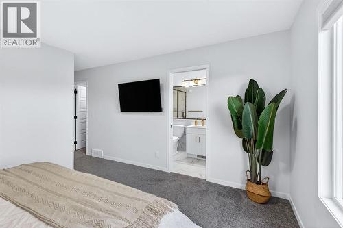 413 Belmont Park Sw, Calgary, AB - Indoor Photo Showing Bedroom