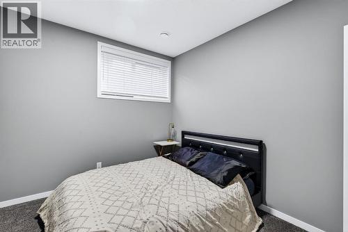 413 Belmont Park Sw, Calgary, AB - Indoor Photo Showing Bedroom
