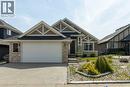 11 Muirfield Close, Lyalta, AB  - Outdoor With Facade 