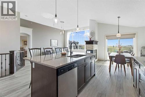 11 Muirfield Close, Lyalta, AB - Indoor Photo Showing Kitchen With Double Sink With Upgraded Kitchen