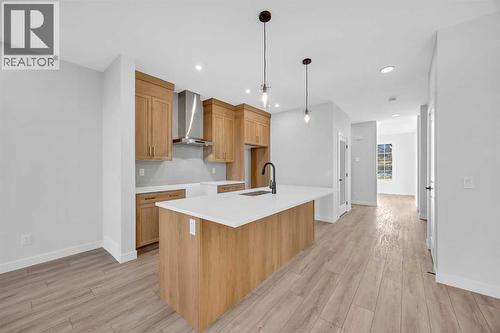 26 Versant Path Sw, Calgary, AB - Indoor Photo Showing Kitchen With Upgraded Kitchen