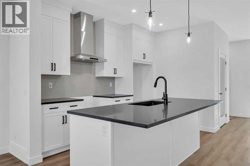 14 Versant Path Sw, Calgary, AB - Indoor Photo Showing Kitchen With Upgraded Kitchen