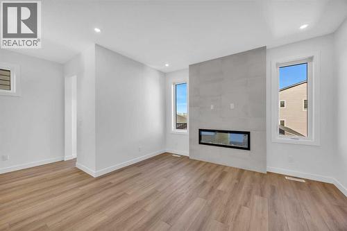 14 Versant Path Sw, Calgary, AB - Indoor With Fireplace