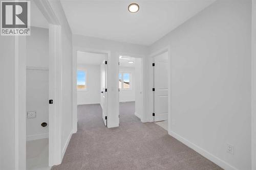 14 Versant Path Sw, Calgary, AB - Indoor Photo Showing Other Room