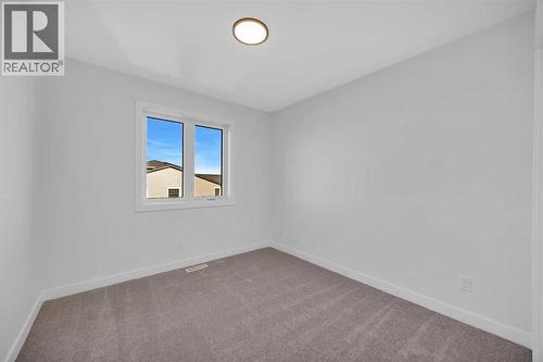 14 Versant Path Sw, Calgary, AB - Indoor Photo Showing Other Room