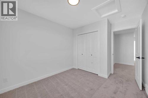 14 Versant Path Sw, Calgary, AB - Indoor Photo Showing Other Room