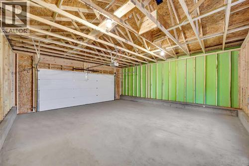 14 Versant Path Sw, Calgary, AB - Indoor Photo Showing Garage