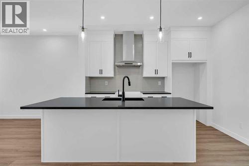 14 Versant Path Sw, Calgary, AB - Indoor Photo Showing Kitchen With Upgraded Kitchen