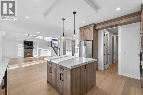 202 Kinniburgh Loop, Chestermere, AB - Indoor Photo Showing Kitchen With Upgraded Kitchen