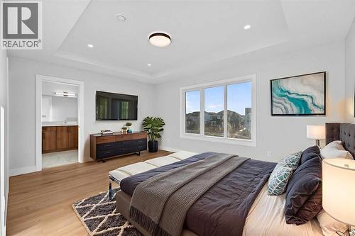 Virtually Staged - 202 Kinniburgh Loop, Chestermere, AB - Indoor Photo Showing Bedroom