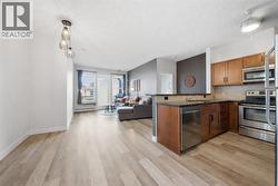 310, 76 Panatella Road NW  Calgary, AB T3K 0V4