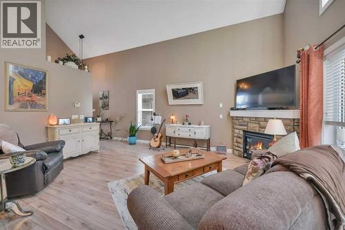 232 Wiley Crescent, Red Deer, AB - Indoor Photo Showing Living Room With Fireplace
