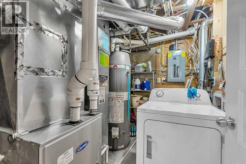 109 Hudson Road Nw, Calgary, AB - Indoor Photo Showing Laundry Room