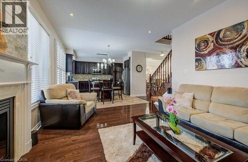 538 Thomas Slee Drive, Kitchener, ON - Indoor Photo Showing Living Room With Fireplace