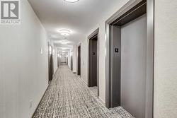 Corridor leading to units. - 