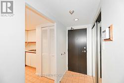 Inside foyer of unit, double closet - 