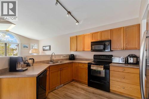 228 Paris Crescent, Fort Mcmurray, AB - Indoor Photo Showing Kitchen With Double Sink