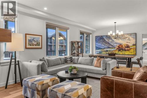 313, 1408 Spring Creek Gate, Canmore, AB - Indoor Photo Showing Living Room