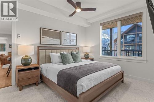 Primary bedroom #1 - 313, 1408 Spring Creek Gate, Canmore, AB - Indoor Photo Showing Bedroom