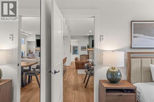 313, 1408 Spring Creek Gate, Canmore, AB - Indoor Photo Showing Other Room