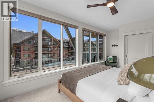 313, 1408 Spring Creek Gate, Canmore, AB - Indoor Photo Showing Bedroom