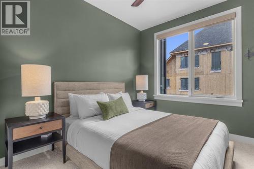 Bedroom #3 - 313, 1408 Spring Creek Gate, Canmore, AB - Indoor Photo Showing Bedroom