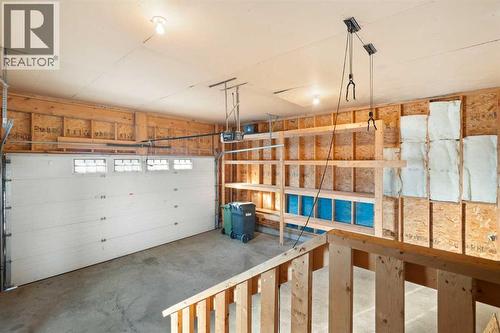 95 Cambridge Glen Drive, Strathmore, AB - Indoor Photo Showing Garage