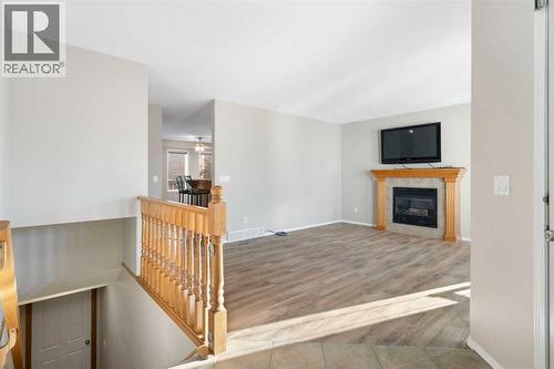 95 Cambridge Glen Drive, Strathmore, AB - Indoor With Fireplace