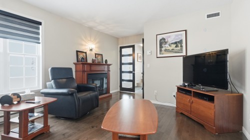 Salon - 1235 24E Rue, Saint-Georges, QC - Indoor Photo Showing Living Room With Fireplace