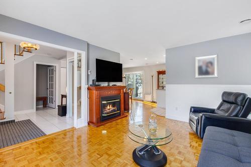 Salon - 500 Rue Odile, Laval (Fabreville), QC - Indoor Photo Showing Living Room With Fireplace