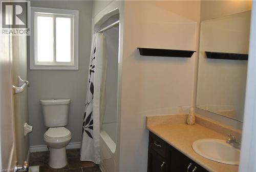 Bathroom featuring shower / bath combination with curtain and vanity - 154 Harding Street, Kitchener, ON - Indoor Photo Showing Bathroom