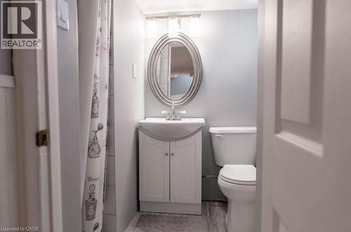 Bathroom with toilet and vanity - 854 West 5Th Street, Hamilton, ON - Indoor Photo Showing Bathroom