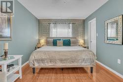 Primary bedroom with walk-in closet & ensuite - 