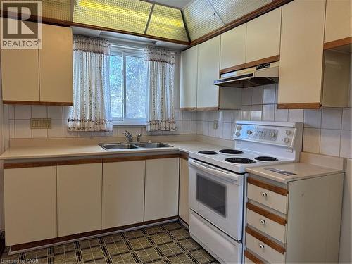 176 Laurier Avenue, Hamilton, ON - Indoor Photo Showing Kitchen With Double Sink