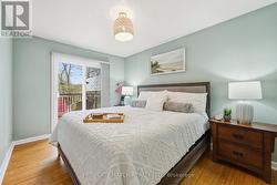 primary bedroom with walkout to deck - 