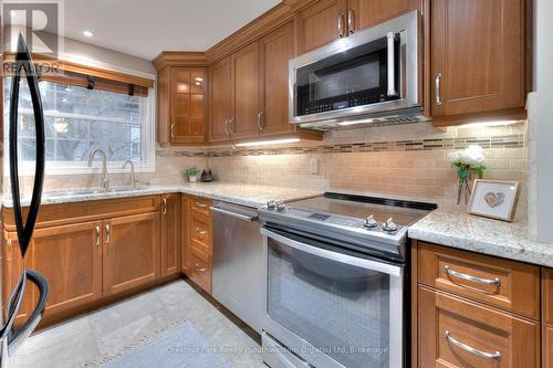 383 Edinburgh Rd S. Guelph, Edinburgh Place Condos - 30 - 383 Edinburgh Road S, Guelph (Dovercliffe Park/Old University), ON - Indoor Photo Showing Kitchen