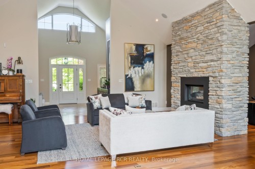 9727 Dundas Street E, Erin, ON - Indoor Photo Showing Living Room With Fireplace
