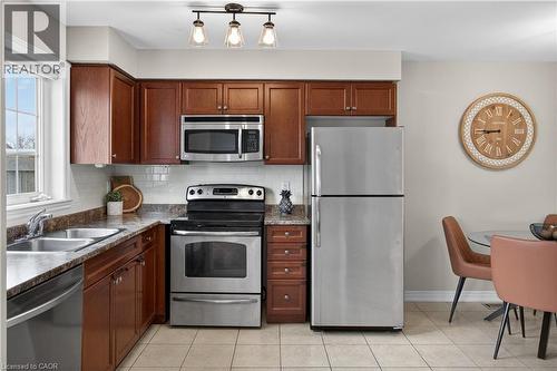 222 Fall Fair Way Unit# 64, Binbrook, ON - Indoor Photo Showing Kitchen With Stainless Steel Kitchen With Double Sink