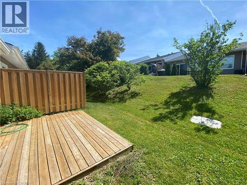 View of yard featuring a wooden deck - 36 Mckenna Court, Hamilton, ON - Outdoor