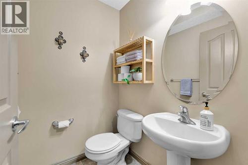 2-pc powder room (main level) - 270 Everstone Drive Sw, Calgary, AB - Indoor Photo Showing Bathroom