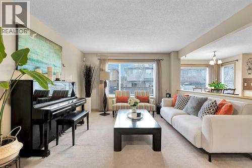 270 Everstone Drive Sw, Calgary, AB - Indoor Photo Showing Living Room