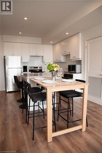 Extendable table that folds out from the island - 255 Northfield Drive E Unit# 506, Waterloo, ON - Indoor