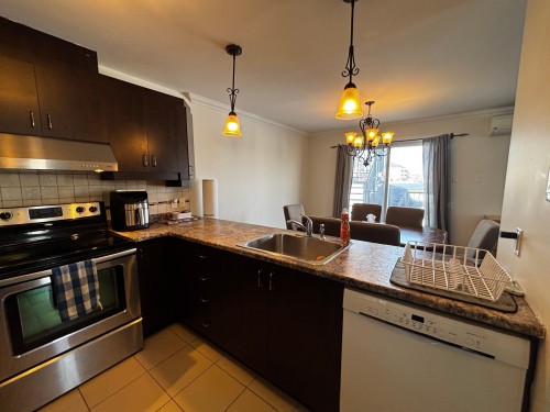 Cuisine - 202-320 Rue Jean-Claude-Tremblay, Vaudreuil-Dorion, QC - Indoor Photo Showing Kitchen