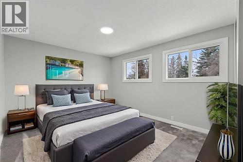 Virtually Staged - 127 Lynnview Way Se, Calgary, AB - Indoor Photo Showing Bedroom