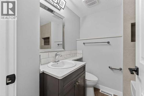 127 Lynnview Way Se, Calgary, AB - Indoor Photo Showing Bathroom