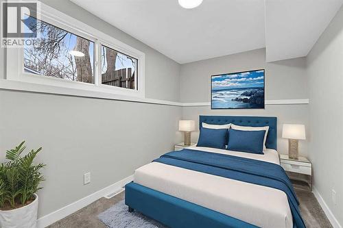 Virtually Staged - 127 Lynnview Way Se, Calgary, AB - Indoor Photo Showing Bedroom