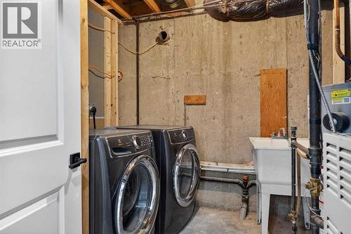 127 Lynnview Way Se, Calgary, AB - Indoor Photo Showing Laundry Room