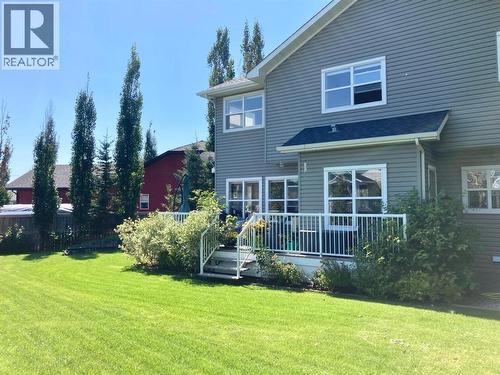 718 Hamptons Bay Se, High River, AB - Outdoor With Deck Patio Veranda