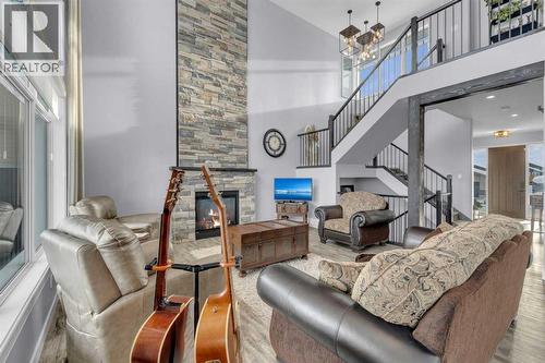 5 Leonard Close, Sylvan Lake, AB - Indoor With Fireplace