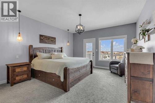 5 Leonard Close, Sylvan Lake, AB - Indoor Photo Showing Bedroom